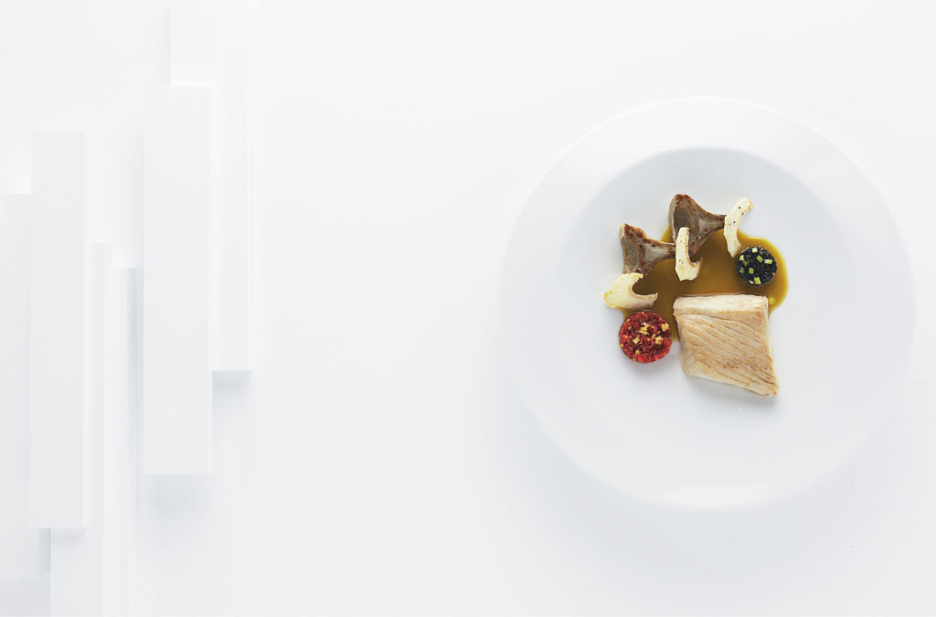 Recette de Halibut cuit doucement, artichauts condimentés tomate truffe